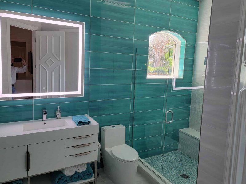 Bathroom-Remodel_Aqua-Colored-Tile-Bathroom-Walk-in-shower